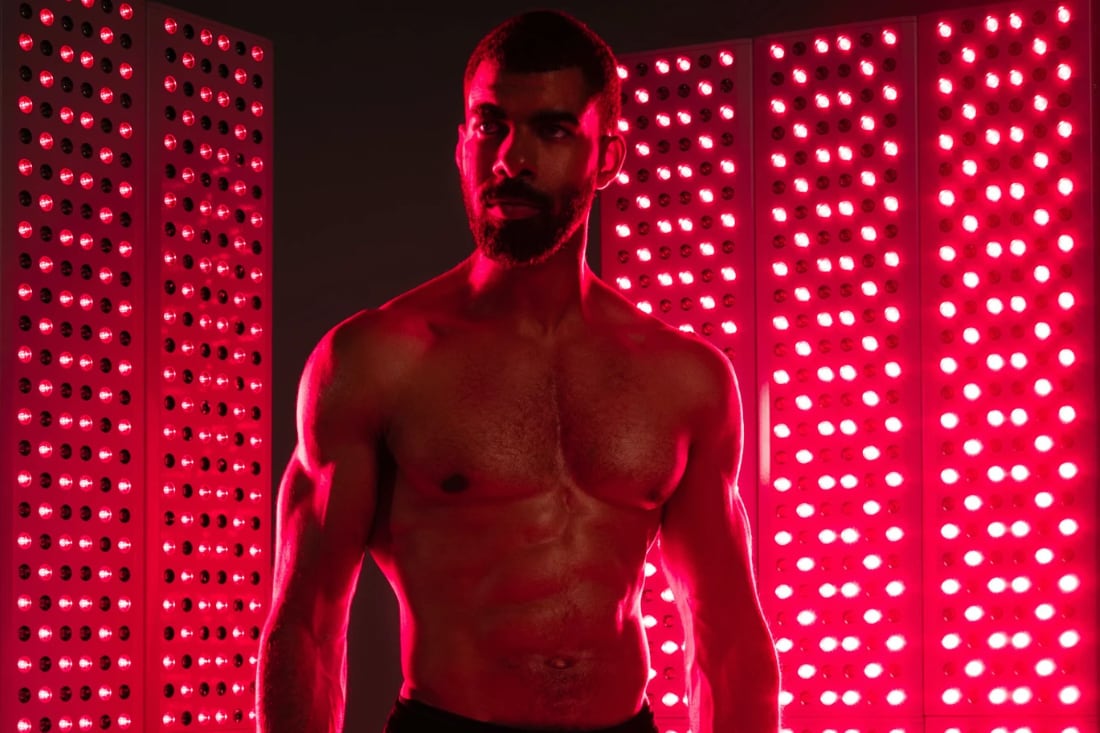 Man stading in JOOVV Red Light treatment