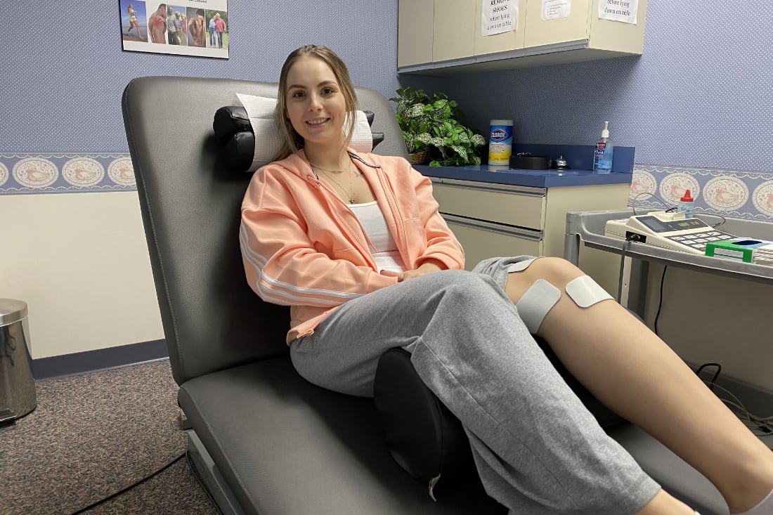 Young woman receiving physical therapy treatment