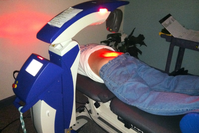 MLS laser treating a patients back pain.